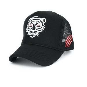Black trucker hat with white tiger head embroidery and red scratch details in side view