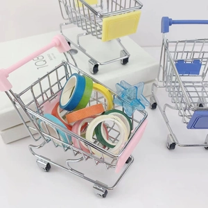 Miniature toy supermarket trolley in pink blue and yellow for desk storage