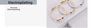Detail of rose gold and silver rhinestone bangles with H-shaped buckle closure