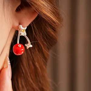 Silver star cherry drop earrings with red enamel finish and yellow zircon accent