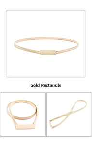 Close-up of golden stretch snake chain belt with a polished metal rectangular buckle