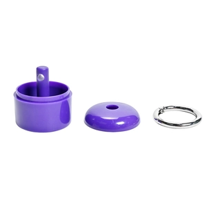 Detailed view of purple jewelry container components with metal ring and glossy finish