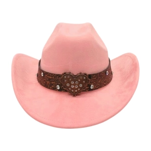 Detailed view of pink suede cowboy hat with vintage pattern leather band and crystal heart