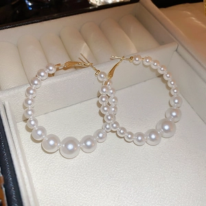 Exaggerated geometric oversized pearl hoop earrings for women with gold metal accents
