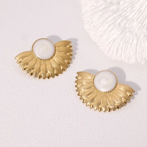 Elegant gold fan-shaped stainless steel earrings with white shell inlay, flat lay view