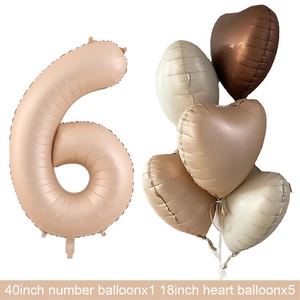 Detail of mocha number 6 balloon with five 18-inch cream heart foil balloons