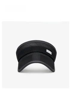 Detail view of black breathable mesh material and curved visor on sun visor hat