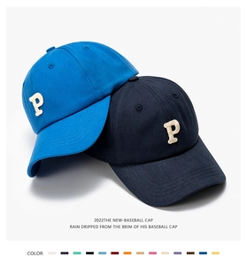 Detail of cotton twill baseball caps with 3D letter P embroidery and breathable holes