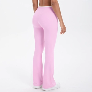 Rear view of pink high-waisted flared yoga pants showing lift and sculpted hip curve