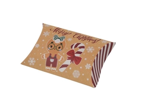 Detail of kraft paper Christmas pillow candy box with gingerbread man and snowflake prints