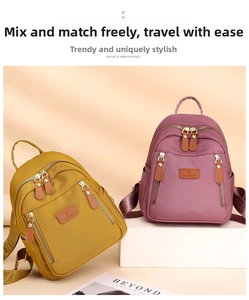 Detail of trendy nylon backpacks in ginger and burgundy with durable metal zippers