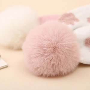 Winter newborn knit baby hat with pink and white plush pom poms for extra warmth