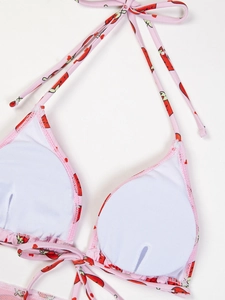 Detail showing pink floral bikini top with removable pads and adjustable halter neck ties