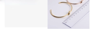 Detail showing vacuum-plated knot cuff bracelet measurements with a ruler