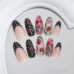 Polka dot press-on nails with cute ladybug and floral patterns in long almond shape