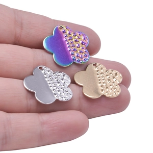 Three 18k gold plated stainless steel flower pendants in gold silver and rainbow colors