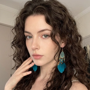 Bohemian peacock blue feather earrings with colorful beads and vintage textured metal
