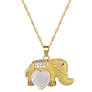 Luxurious elephant pendant necklace with white opal inlay and sparkling crystal details