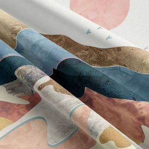 Macro detail of Nordic landscape tapestry fabric showing abstract hills and sun print