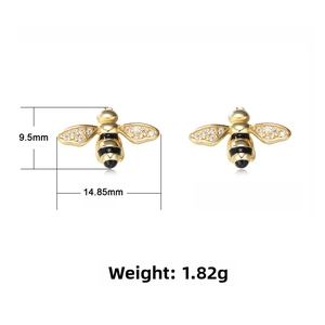 Detailed view of bee studs with dimensions 9.5mm by 14.85mm and sparkling crystals