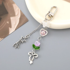 Silver Y2K butterfly and flower keychain with star pendant and colorful resin charms