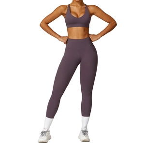 Women's quick-dry yoga set in purple-grey featuring sports bra and high-waist leggings
