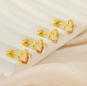 Detail of heart stud earrings with sparkling crystals and secure screw-back closures