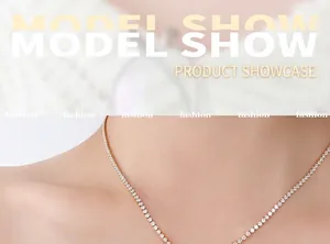 Close-up of a gold tennis necklace featuring pave-set round cubic zirconia stones