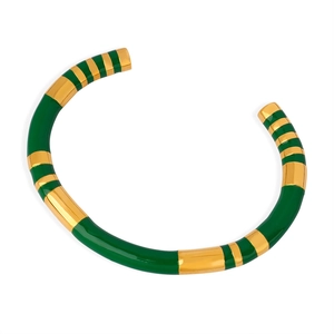 Retro C-shape open bangle with gold-plated stripes and green enamel finish on white background