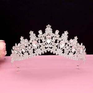 Macro detail of silver baroque bridal crown featuring pear-shaped rhinestones