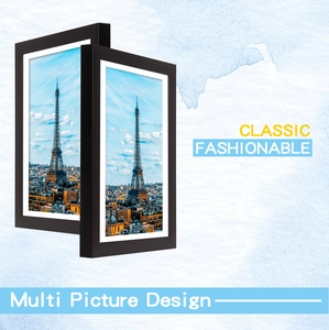 Detail of stacked black minimalist frames with Eiffel Tower art and multi-picture design