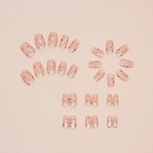 Polka dot cat eye press-on nails set in pink with multi-size nail art pieces