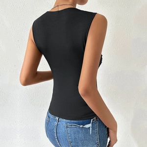Back view of a black slim-fit sleeveless knitted top paired with casual blue denim jeans