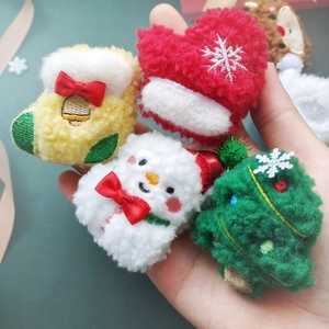 Plush Christmas accessories collection with snowman, tree and heart glove charms