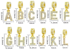 Detailed view of gold A-L letter pendants with clear zirconia and size measurements