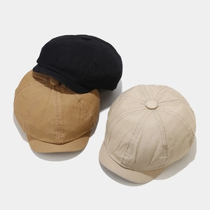 Classic cotton newsboy caps in black, khaki, and beige colors with octagonal panel design