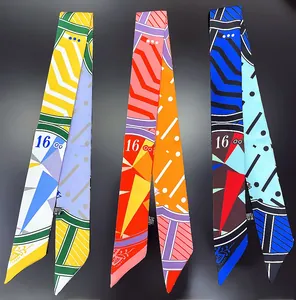 Detailed view of three twilly scarves featuring geometric patterns and number 16 design
