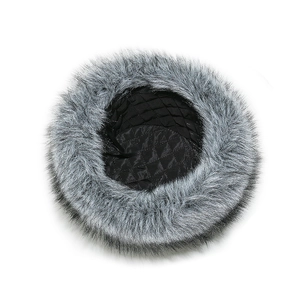 Detail view of winter faux fox fur bucket hat with thick black quilted lining