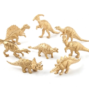 8-piece set of golden dinosaur figurines for parties, featuring Pterosaur and Triceratops