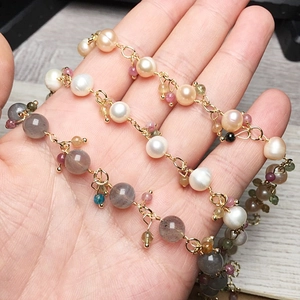 Freshwater pearl bracelet with tourmaline and labradorite on gold wire wrapping