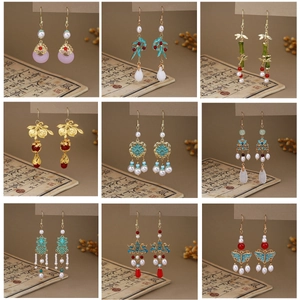 Selection of Chinese style tassel earrings with pearls and jade-like enamel charms