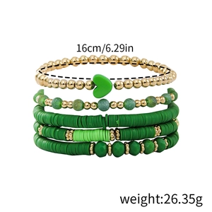 Detail of 5-piece green clay bead bracelet set with gold heart charms and sizing info