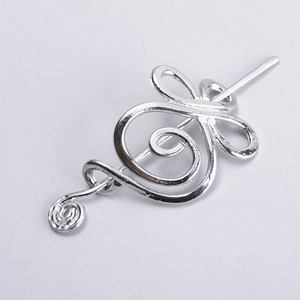 Silver Viking Celtic knot metal hair slide with decorative hairpin on white backdrop