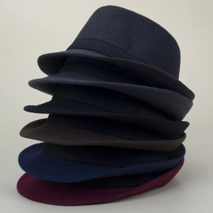 Detailed stack of felt fedora hats in six colors like navy, charcoal, black, and burgundy