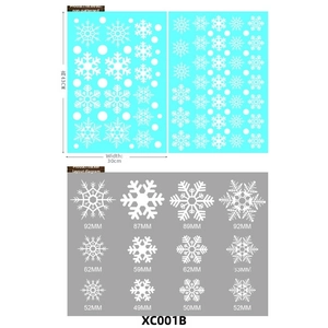 Detail layout of white snowflake static window stickers showing various sizes and patterns