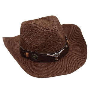 Detail of dark brown cowboy hat featuring leather band and silver bull head emblem