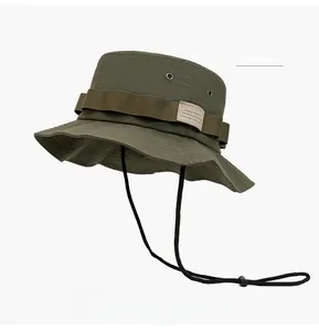 Detail of military green quick-dry outdoor hat with adjustable drawstring and woven label