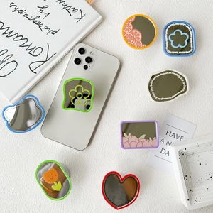 Variety of aesthetic phone grip mirrors featuring floral and fruit patterns in soft tones