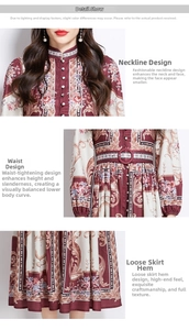 Detail view of the stand-up collar, belted waist and printed hem of this vintage dress