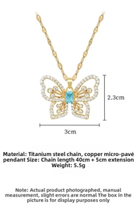 Macro shot of titanium steel butterfly pendant with dimensions and blue crystal inlay